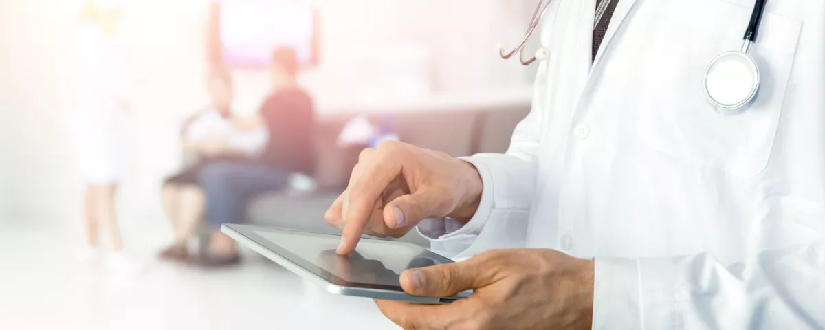 doctor using tablet for healthcare automation