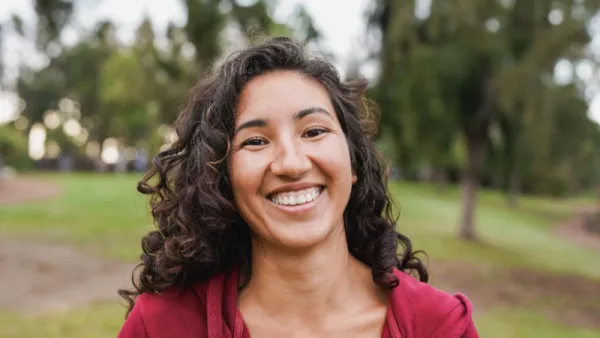 native american woman smiling outdoors