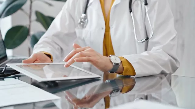 doctor accessing documents digitally