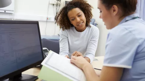 doctor and patient with computer